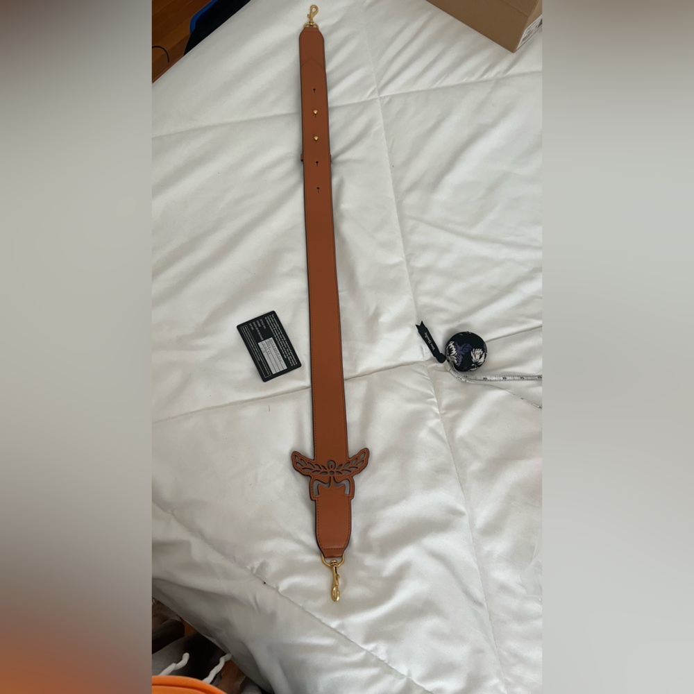 MCM  Tan Leather strap.